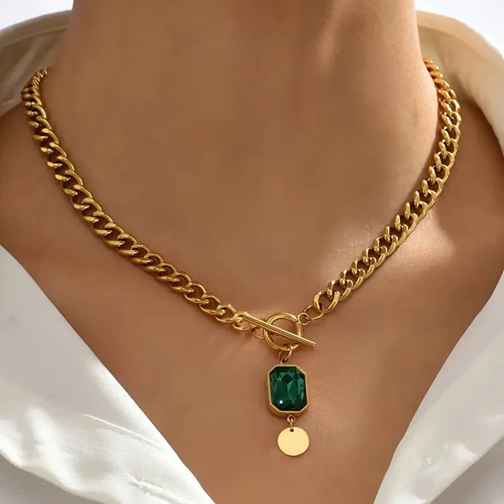 Gold necklace emerald pendant
