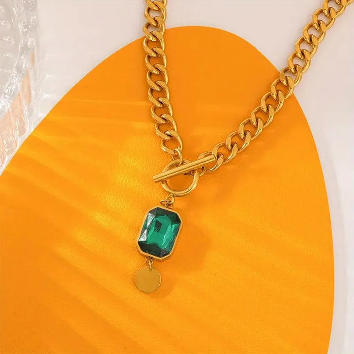 Gold necklace emerald pendant