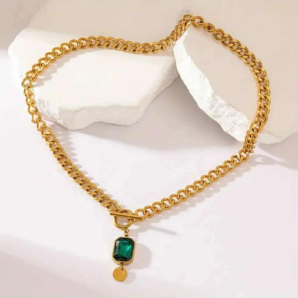 Gold necklace emerald pendant