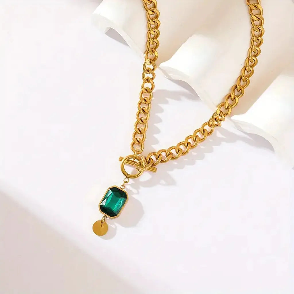 Gold necklace emerald pendant