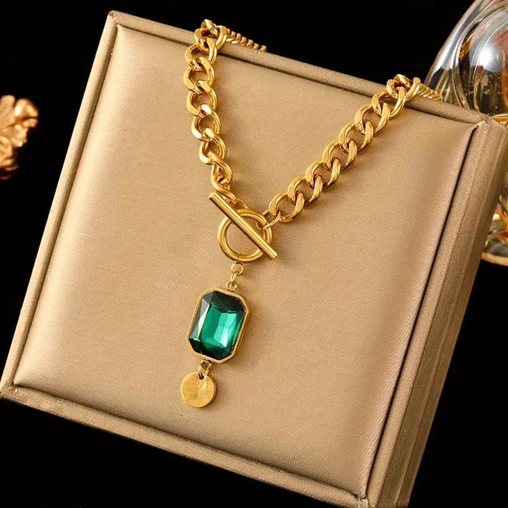 Gold necklace emerald pendant
