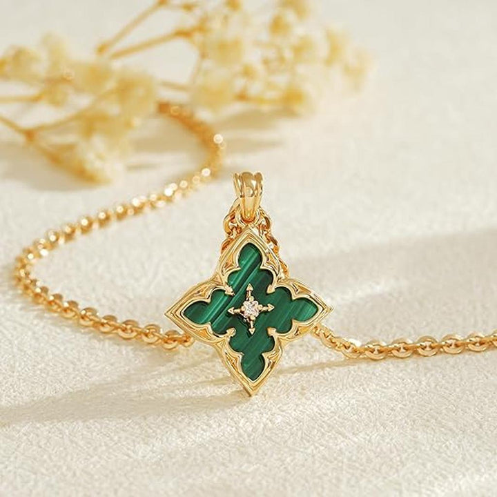 Emerald four-leaf clover gold necklace